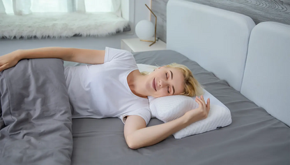 AlignRest neck support pillow on a bed